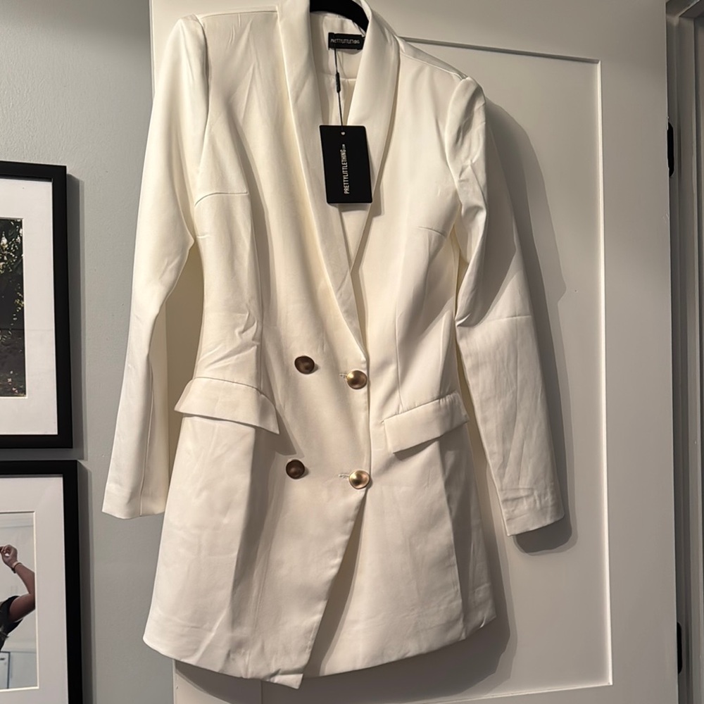 White Lined Double-Breasted Blazer wear as a long blazer or dress.